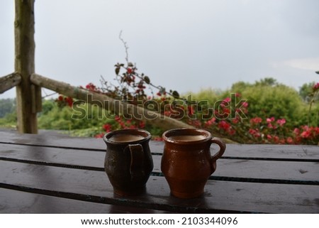 Two coffeemugs made of stoneware inviting for a break. 