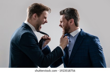 two colleagues have disagreement and conflict. businessmen face to face. disrespect and contradiction. business partners blame each other. arguing businesspeople. dissatisfied men discuss failure.