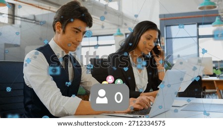 Two colleagues are working in flat design office, showing floating social icons for business tech. Collaboration, technology, workspace, communication, professionalism, innovation, networking