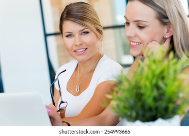 Two collegues in an office - Shutterstock ID 254993665