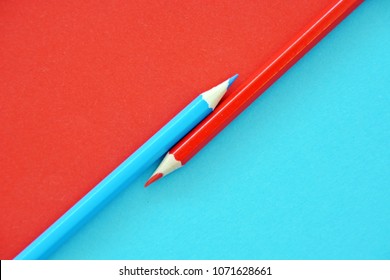 Two colored pencils split