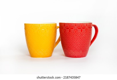 Two Colorful Mugs Isolated On White Background
