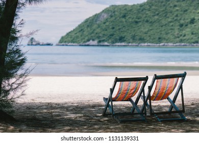 Two Colourful Beach Chair on The Beach