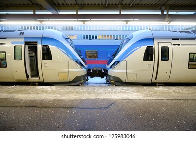 Two commuter trains connected.