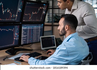 Two Confident Stock Broker Looking At Screen, Analyzing Index On Crypto Currency Market Diagram, Working In Office Together