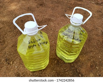 Two Container Of 'sodium Hypo Chlorite', A Type Of Disinfectant. Disinfectant Used To Sanitize The Work Area During Corona Virus Pandemic. Selective Focus On The Container. 