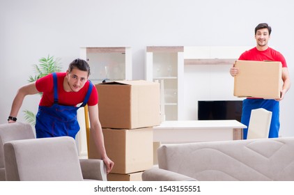 Two Contractor Employees Moving Personal Belongings Stock Photo 