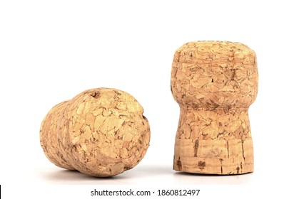 Two corks of champagne over a white background. Two corks of champagne close-up. - Powered by Shutterstock