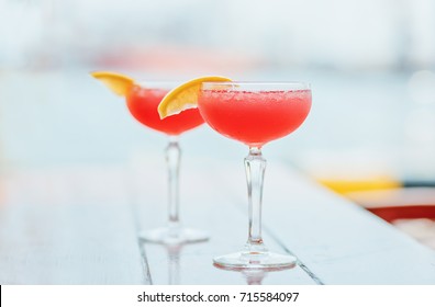 Two Cosmopolitan Cocktails On The Table