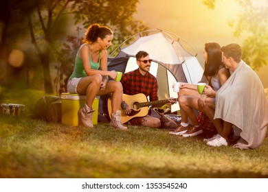 
Two couples camping together, vacation and fun  - Powered by Shutterstock