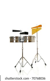 two cowbells and timbales on white background
