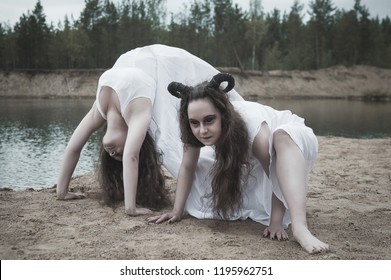 Two Creepy Twins Demons With Horns Outdoor