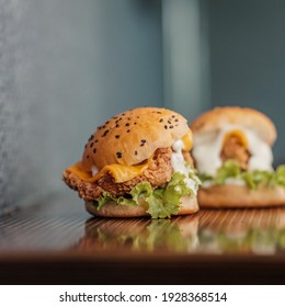 Two Crispy Chicken Burger Sliders On A Table, Mini Burger