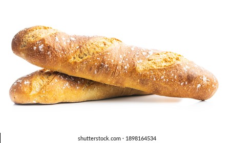 Two crispy fresh baguettes isolated on a white background. - Shutterstock ID 1898164534