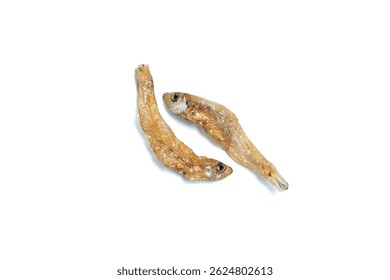Two Crispy fried salted anchovies on isolated white background, Top view