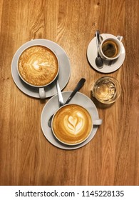 Two cups of coffee on the table. Flat lay photo