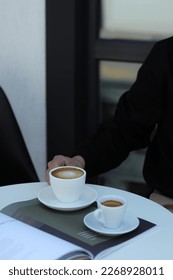 two cups of coffee on the table
