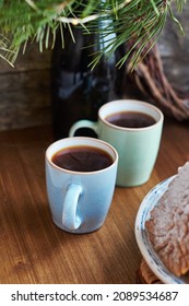Two cups of coffee. Side view.