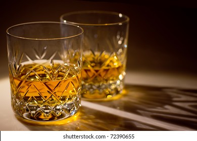 Two Cut Crystal Whisky Glasses With Whisky