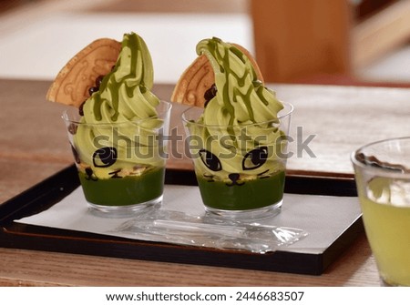 Two cute matcha tea parfaits with matcha ice cream and gelating