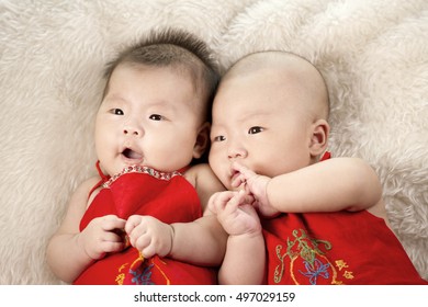 Two Cute Twin Babies