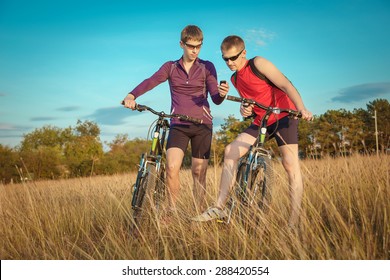 two cyclists on the nature
