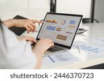Two data analysts Working on data analysis dashboard for business strategy