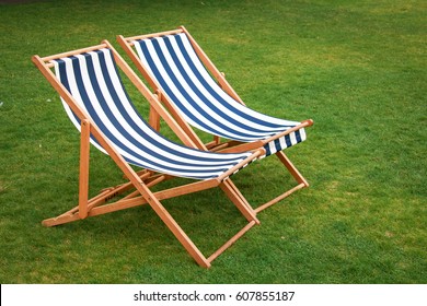 The Two Deck Chairs On The Lawn