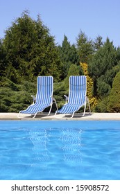 Two deckchairs at the pool