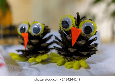 Two decorative owls made of cones. Handmade - Powered by Shutterstock