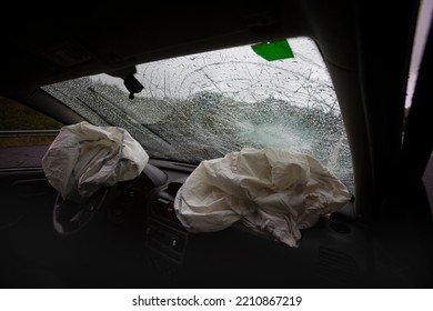 Two Deflated Airbags In A Car After A Traffic Accident