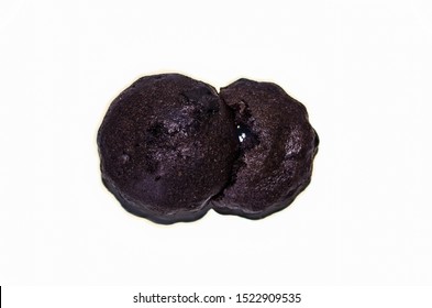 Two Delicious Brownies One Eating The Other As In Pacman, Isolated In White Background