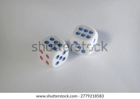 
two dice with the numbers six