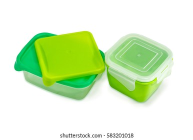 Two Different Green Reusable Plastic Food Storage Containers With Covers For Home Use On A Light Background
