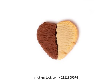 Two Different Halves Of Lemon And Chocolate Cookies In The Shape Of A Heart