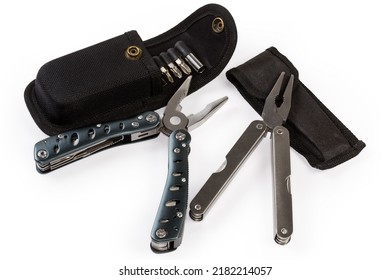 Two different multi-tools with metal handles and open pliers, their cases on a white background - Shutterstock ID 2182214057