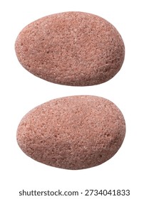 Two different sides of the same stone, isolated on a white background. Close-up of the pebble texture.