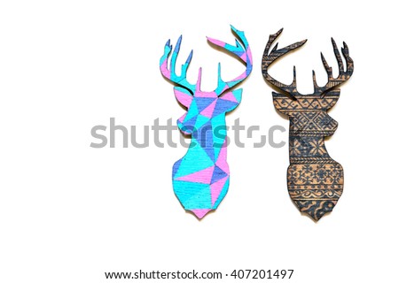 Two different wooden emblems of deer  on white background isolated. 