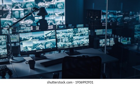 Two Digital Computer Screens with Surveillance CCTV Video in a Harbour Monitoring Center with Multiple Cameras on a Big Digital Screen. Employees Sit in Front of Displays with Big Data - Shutterstock ID 1936992931