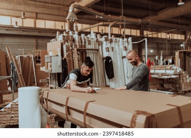 Two diligent workers collaboratively prepare the final wooden product for plasma treatment, ensuring impeccable quality and craftsmanship as they ready it for the global market, exemplifying