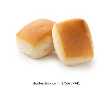 Two dinner rolls on a white background