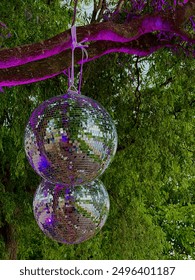 Two disco balls in the park