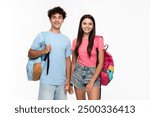 Two diversity high school pupils students teenagers classmates boy and girl in casual clothes with bag standing posing looking at camera isolated on white background. Education back to school concept