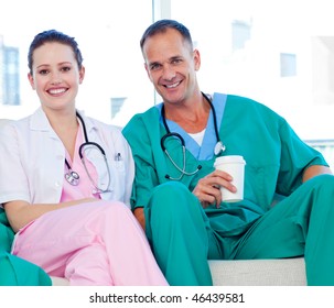 Two Doctors Relaxing In The Staff Room In A Hospital