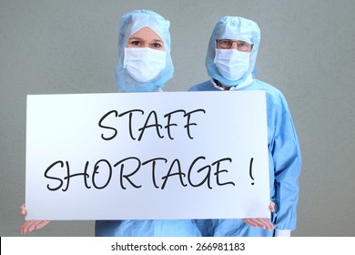 Two Doctors With Shield Staff Shortage