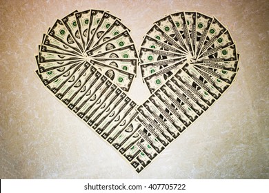 Two Dollar Bills Making A Heart Symbol On A White Background, Money Heart, Money Origami