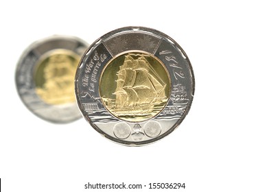 Two dollar coins isolated on white background