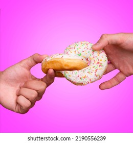 Two Donuts Tied Together At Pink Background