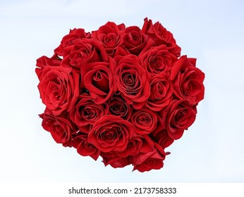Two Dozen Red Roses In A Circular Boquet