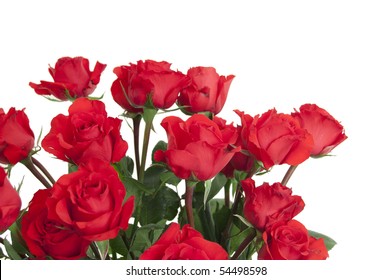 Two Dozen Red Roses Isolated On White Background With The Green Stems In A Large Glass Vase With Water. Copyspace On All Four Sides.